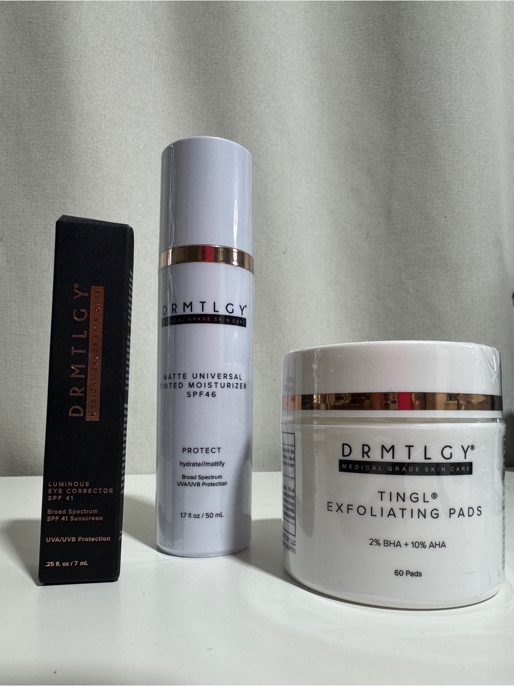 DRMTLGY Lot Matte Universal Tinted Moisturizer, Eye Corrector, Exfoliating Pads
